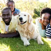 Family outside with dog